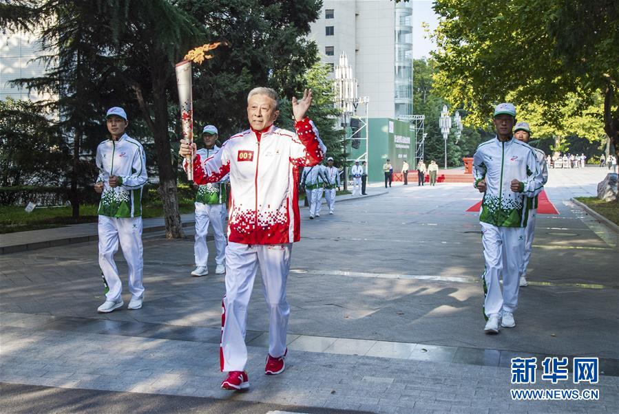(軍運會·圖文互動)(1)軍運會火炬傳遞活動在火箭軍工程大學舉行(配本社同題文字稿)