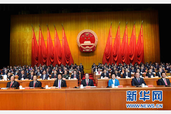 10月1日,慶祝中華人民共和國成立66周年暨新疆維吾爾自治區成立60周年大會在新疆人民會堂隆重舉行。 新華社記者 饒愛民 攝 10月1日,慶祝中華人民共和國成立66周年暨新疆維吾爾自治區成立60周年大會在新疆人民會堂隆重舉行。 新華社記者 饒愛民 攝