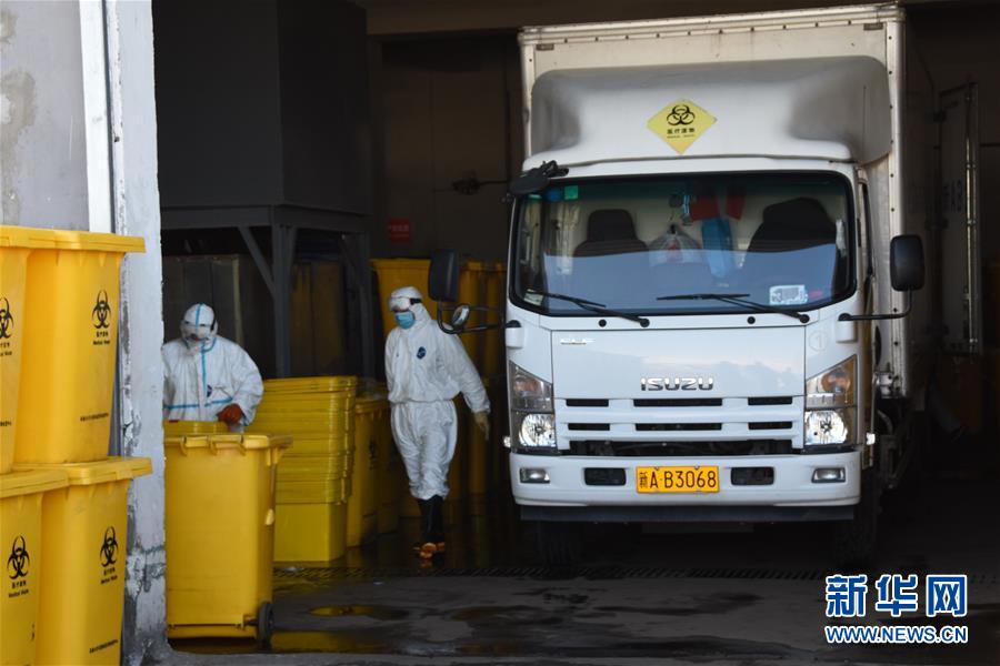 (聚焦疫情防控·圖文互動)(1)另類“白衣戰士”:堅守醫療廢物處置第一線