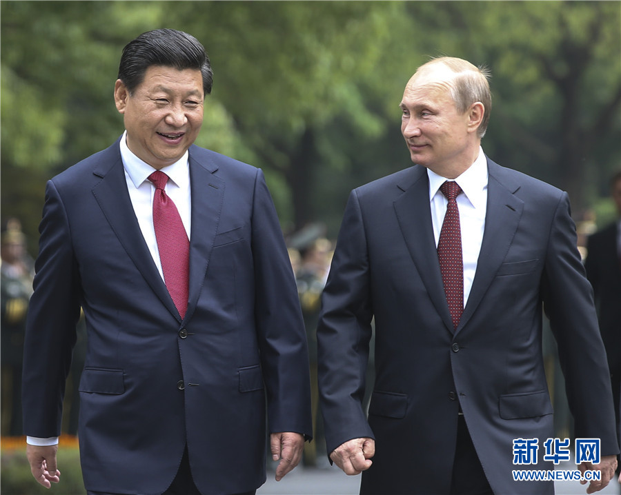 這是會談前，習近平在上海西郊會議中心廣場為普京舉行歡迎儀式。新華社記者 蘭紅光 攝 