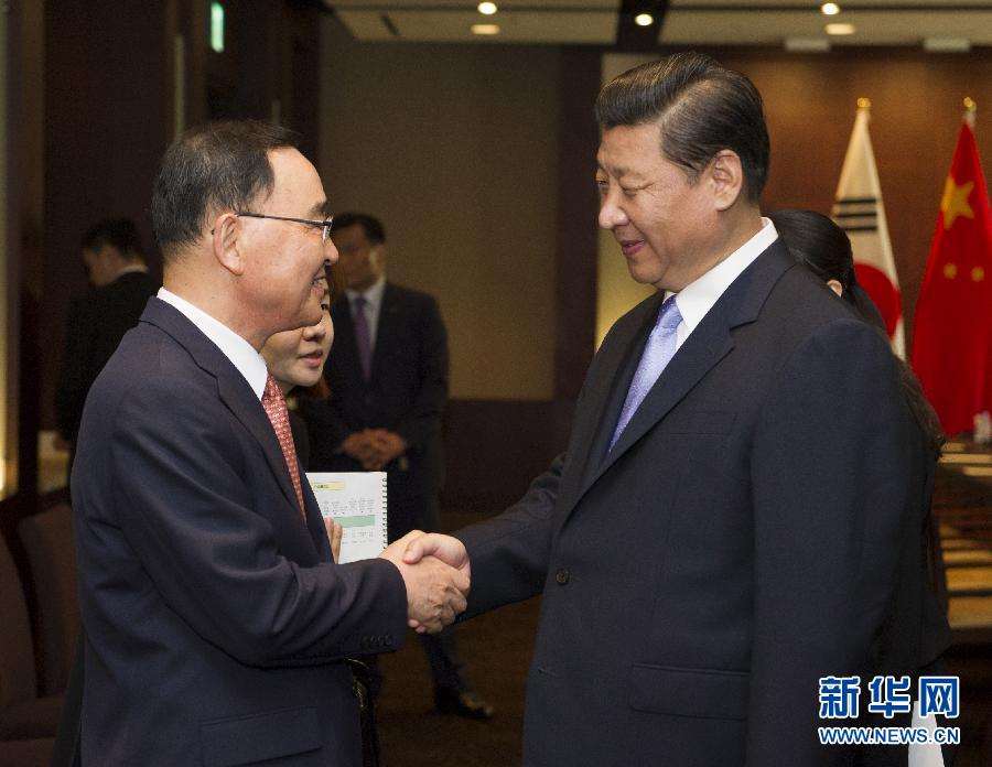 7月4日，國家主席習近平在首爾會見韓國總理鄭烘原。 新華社記者謝環馳攝  