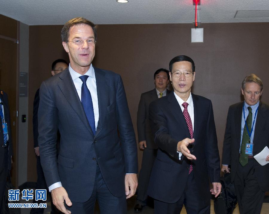 9月23日，出席聯(lián)合國氣候峰會的國家主席習(xí)近平特使、國務(wù)院副總理張高麗在紐約聯(lián)合國總部會見荷蘭首相呂特。 新華社記者 王曄 攝 