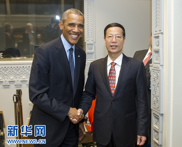 9月23日，國家主席習(xí)近平特使、國務(wù)院副總理張高麗在紐約會見出席聯(lián)合國氣候峰會的美國總統(tǒng)奧巴馬。 新華社記者王曄攝