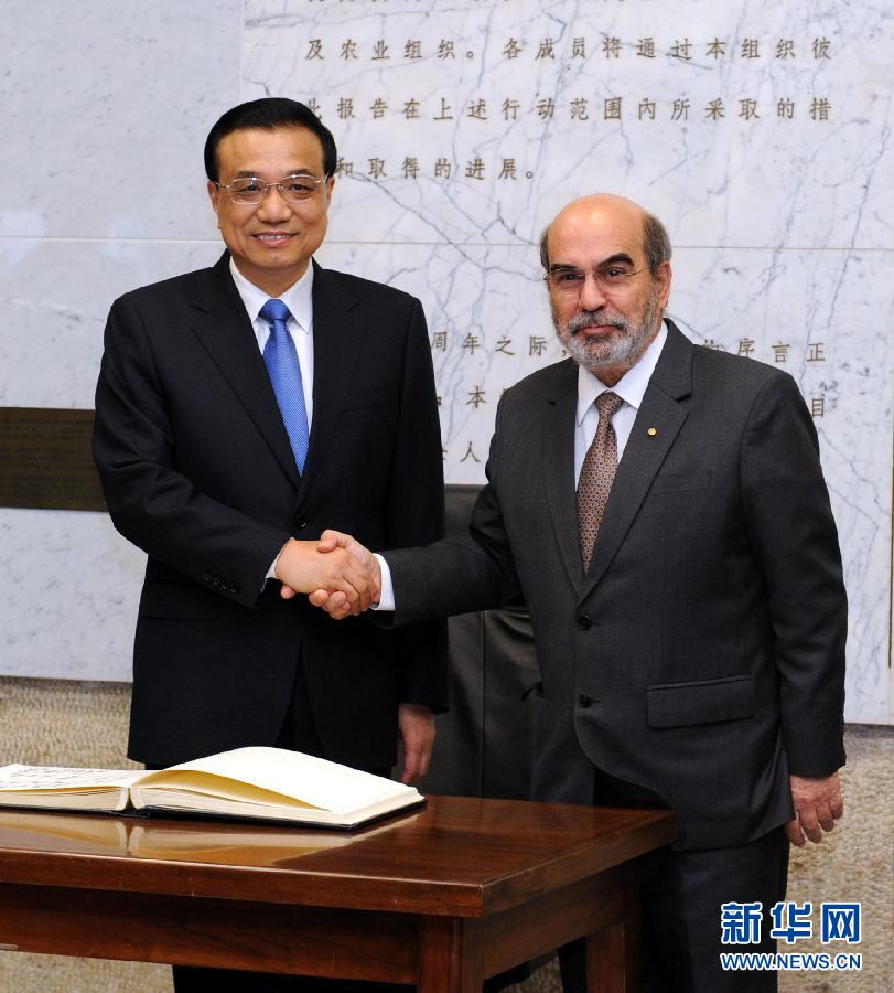 10月15日，中國(guó)國(guó)務(wù)院總理李克強(qiáng)在羅馬會(huì)見(jiàn)聯(lián)合國(guó)糧農(nóng)組織總干事格拉齊亞諾。 新華社記者 饒愛(ài)民 攝