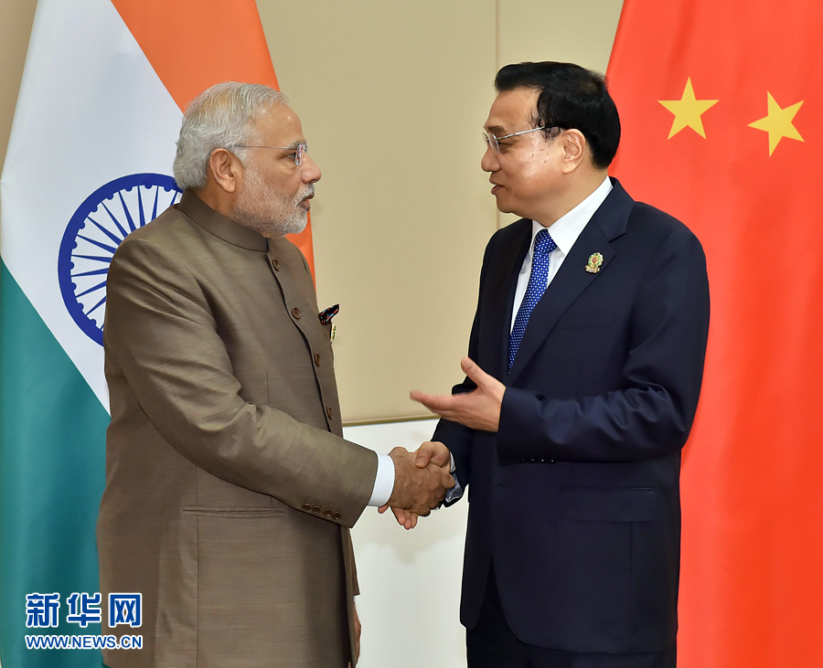 11月13日，中國(guó)國(guó)務(wù)院總理李克強(qiáng)在緬甸內(nèi)比都會(huì)見(jiàn)印度總理莫迪。 新華社記者 李濤 攝